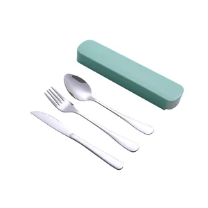 Detail showing 3-piece stainless steel cutlery set with green portable storage case.