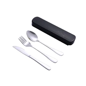 Portable stainless steel cutlery set with spoon, fork, and knife in a black storage case.