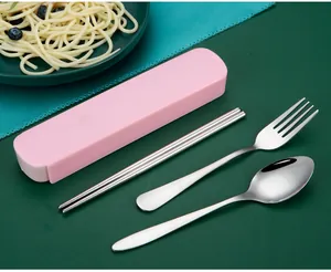 Portable stainless steel cutlery set with spoon, fork, and chopsticks in a pink case
