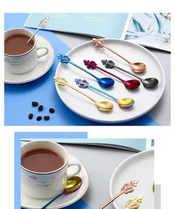 Detailed view of colorful 304 stainless steel coffee spoons with crown design.