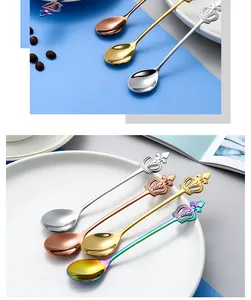 Macro view showing crown handle detail and metallic finish of stainless steel spoons