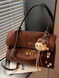 Vintage brown frosted suede tote bag with a cute bear charm for women's daily commute