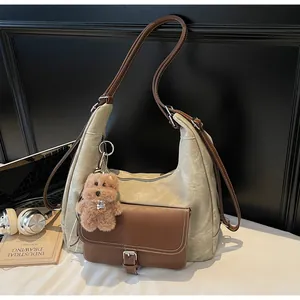Large capacity canvas hobo bag with brown leather straps and cute teddy bear charm