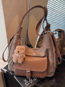 Stylish brown large capacity tote bag with bear charm for women's travel and daily commute