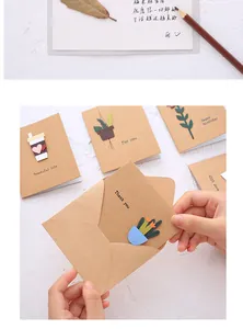 Detailed view of a handmade 3D kraft paper greeting card featuring unique floral designs