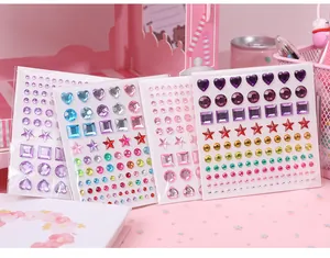 Detailed macro view of colorful 3D heart and star gemstone sticker sheets