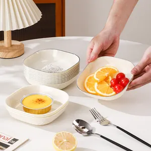 Cream-colored square snack plates for fruits and appetizers with hammered texture