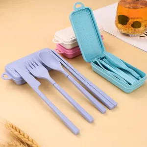 Portable wheat straw cutlery set with reusable travel utensils and storage case.