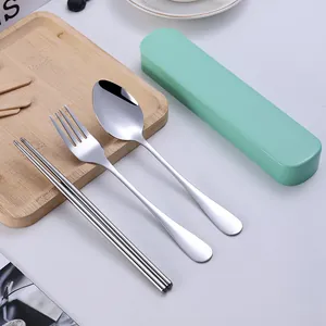 Portable stainless steel cutlery set with spoon fork chopsticks and green storage box