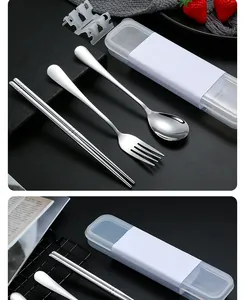 Detail view of portable 304 stainless steel cutlery set with spoon, fork, and chopsticks