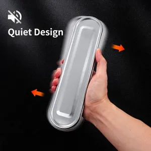 Hand holding a portable silver stainless steel cutlery case to demonstrate silent design