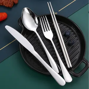 Elegant silver stainless steel cutlery set including knife, fork, spoon, and chopsticks