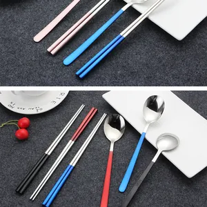 Detail showing 304 stainless steel chopsticks and spoons with colorful handles