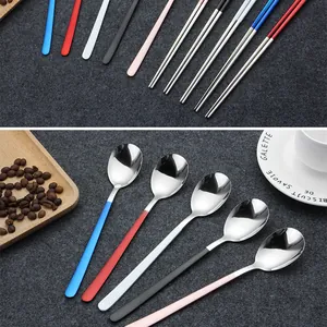 Close-up detail of multi-colored 304 stainless steel spoons and matching chopsticks