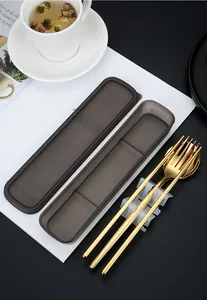Detailed view of the gold 3-piece stainless steel cutlery set with portable case.