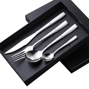 4-piece stainless steel cutlery set including knife fork and spoons in a gift box