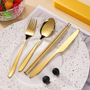 Elegant 4-piece gold stainless steel cutlery set with fork, spoon, knife, and chopsticks