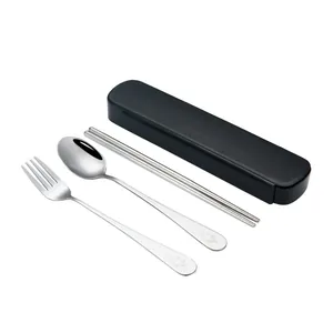 Portable stainless steel cutlery set with spoon, fork, and chopsticks in a black case.
