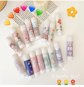 Collection of colorful cartoon glue sticks for cute DIY scrapbooking and crafts.