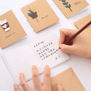 Handcrafted 3D popup greeting cards made of vintage kraft paper with envelopes.