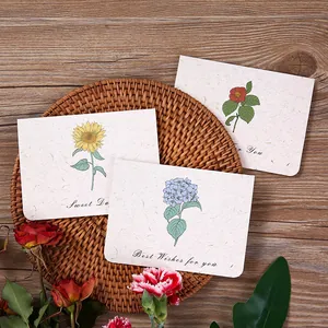 Tarjetas de felicitación botánicas vintage con ilustraciones florales a mano.