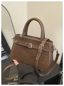 Vintage brown suede and leather tote bag for women, commuter crossbody style with buckles