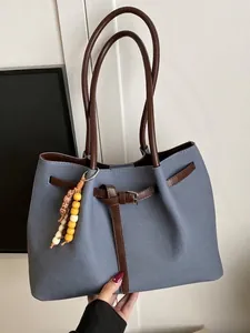 Vintage μπλε πάνινη τσάντα tote με καφέ δερμάτινα λουράκια.