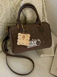 Vintage leopard suede Boston bag with a cute cookie charm and shoulder strap for women
