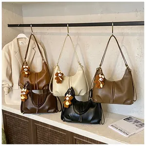 Selection of minimalist large capacity tote bags in multiple earthy tones