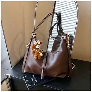 Large capacity brown vintage tote bag with cute bear charm for versatile commuting style.