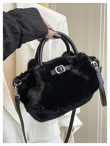 Detailed macro view of the plush black faux fur texture on this stylish handbag