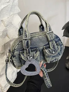 Retro washed denim boston bowling handbag with shoulder strap and heart mirror charm