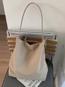 Grand sac cabas en toile beige minimaliste pour femme, idéal pour l'école ou le shopping