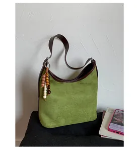 Vintage green suede hobo bag with large capacity and decorative beaded keychain charm