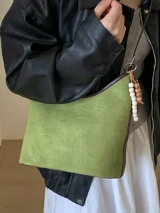 High-quality vintage green suede hobo shoulder bag with stylish beaded charm for women