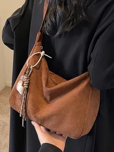 Vintage large brown suede shoulder bag for women, ideal for commuter and leisure wear