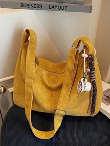 Large vintage mustard yellow suede hobo bag with coffee charm for casual daily commute