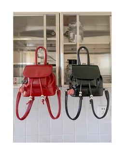 Stylish red and black mini backpacks made of shiny PU leather with cute cherry charms