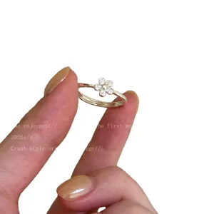 Elegant silver flower zircon ring for women featuring a sparkly adjustable open band.