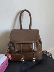 Elegant brown PU leather mini backpack with cherry charm for stylish daily travel