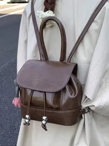 Stylish brown faux leather mini backpack for women with drawstring and flap closure