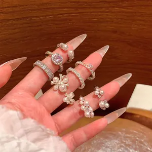 Detailed view of French Baroque pearl open rings with zircon stones for chic stacking