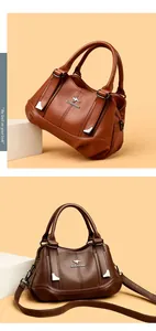 Sophisticated multi-compartment soft leather handbag for women in brown and tan