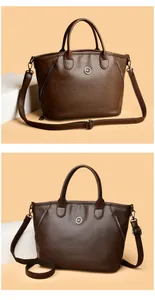 Vintage brown textured leather handbag with crossbody strap and large capacity