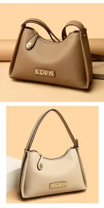 Premium women's pebbled leather shoulder bags in khaki and beige with gold logo detail