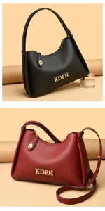 Detailed view of elegant textured leather shoulder bags in black and burgundy variants