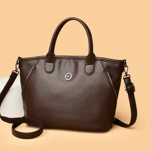 Vintage dark brown textured faux leather handbag with detachable shoulder strap and handles