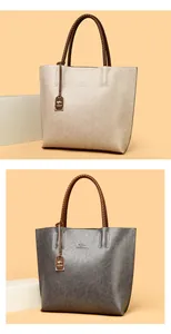 Bolsos tote grandes de moda para mujer con textura de cuero vintage y asas trenzadas