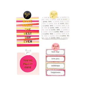 Assorted gold foil thank you stickers and decorative cards for wedding gift seals