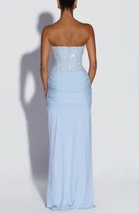 Back detail of light blue strapless evening dress with sequined bodice and ruched skirt